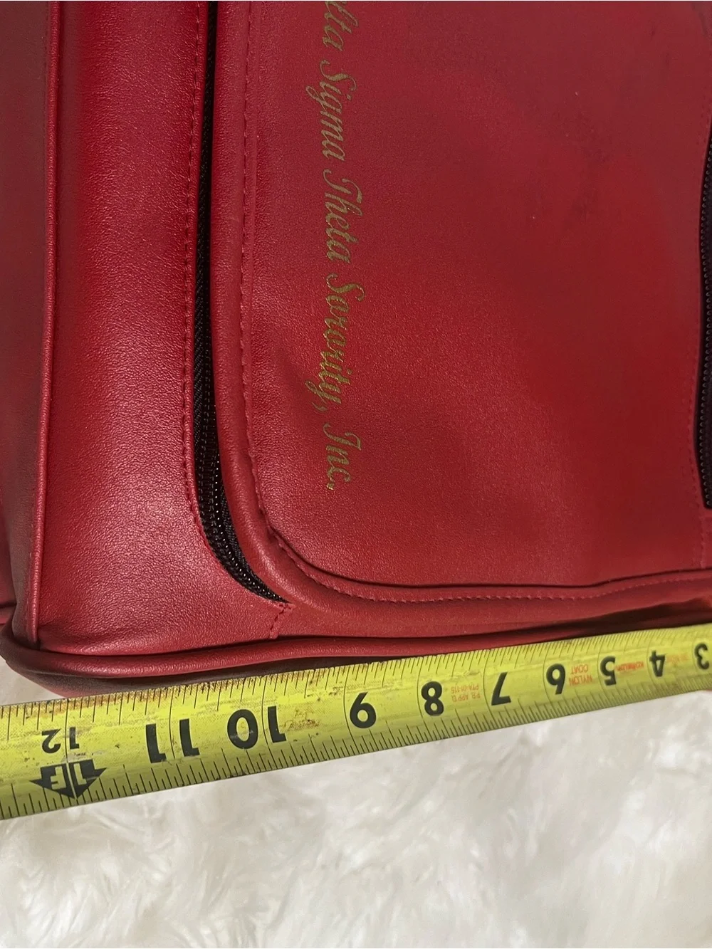 Christopher Pierce Entreprise red shoulder